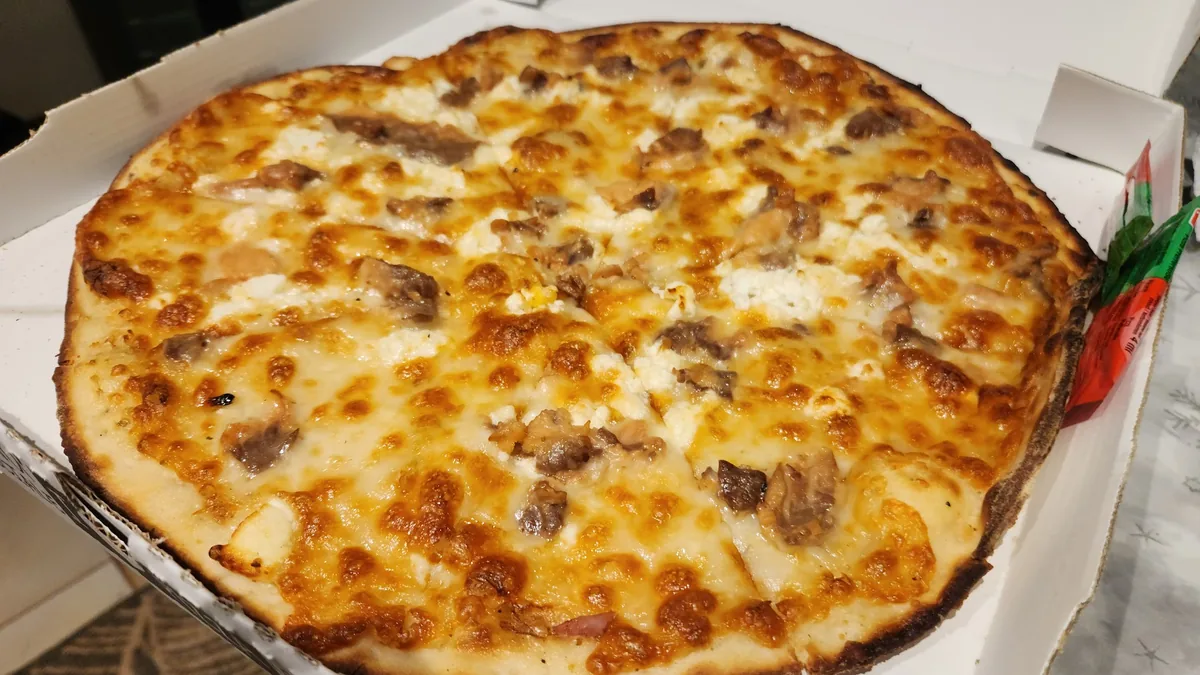 Yowko Pizza, poisson au lait de coco